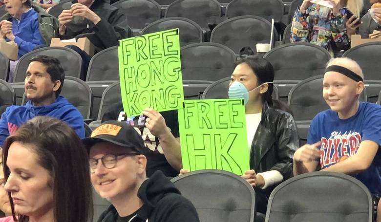 Holding Pro-Hong Kong Signs, Two NBA Fans Booted From Game—in Philadelphia, USA