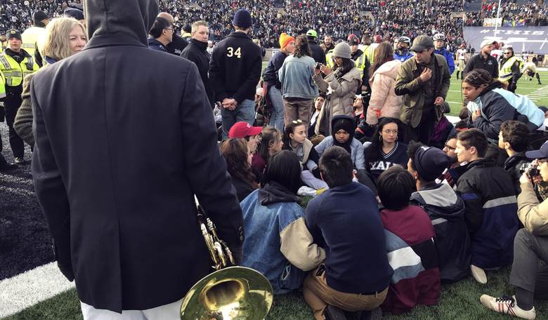 Students Storm the Field at Harvard-Yale Game to Protest Climate Change