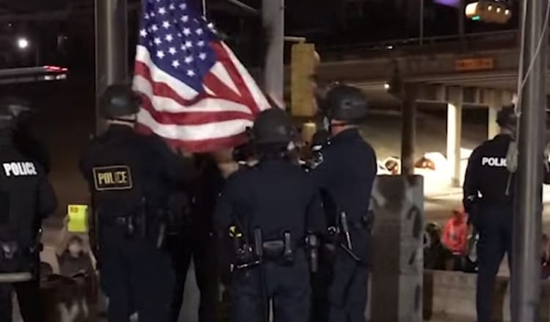EXCLUSIVE VIDEO: Austin Demonstrators Who Raised Transgender Flag Jeer as Police Raise American Flag
