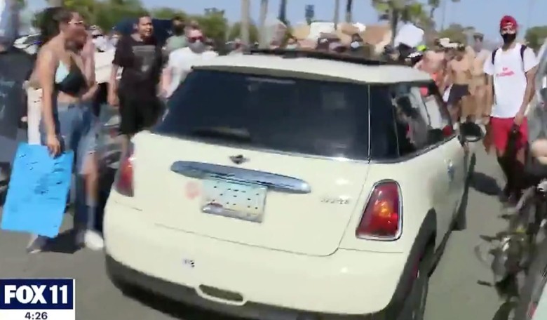 Driver Makes Path Through Protesters in Newport Beach, CA and Drives Straight to Jail