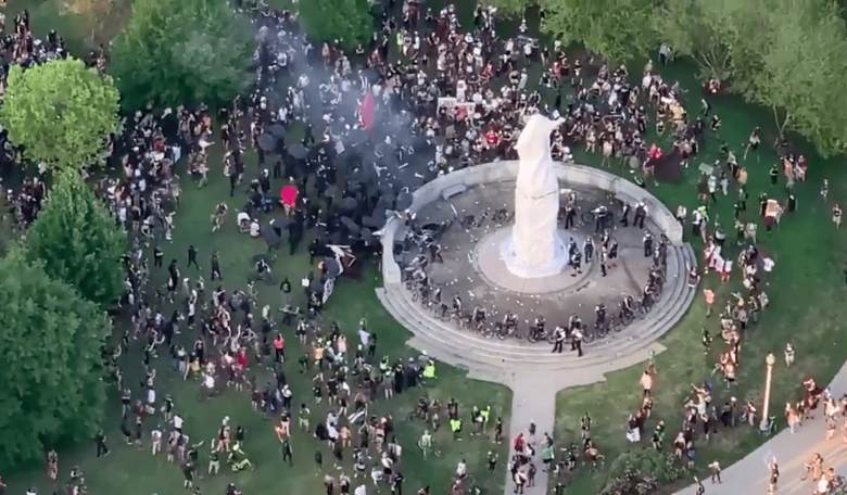 UNDER SIEGE: Antifa Rioters Throw Cans, Shoot Fireworks at Cops in Battle for Columbus Statue