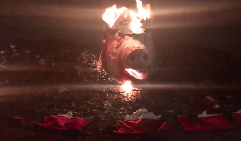 Straight-Up Terrorism: Antifa Burns Severed Pig's Head With a Police Hat on Top