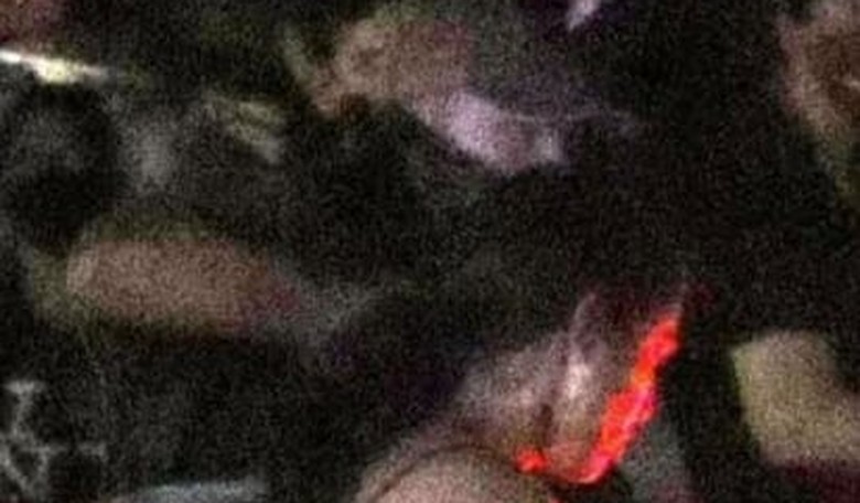 Photo Appears to Show Garrett Foster With Rifle Next To Surrounded Car Moments Before Austin Shooting