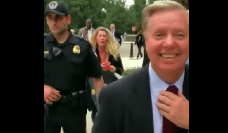 [VIDEO] Shrieking Harpies Accost Lindsey Graham at the Airport—and Instantly Regret It