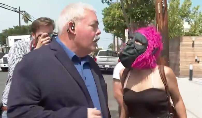 Disturbing: Woman in Gorilla Mask Hurls Eggs, Obscenities at Black GOP Candidate Larry Elder as Reporter Laughs