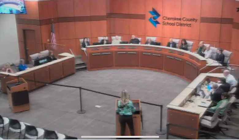 Watch What Happens When a Mother at a School Board Meeting Tries to Read Explicit Content Served Up to Students