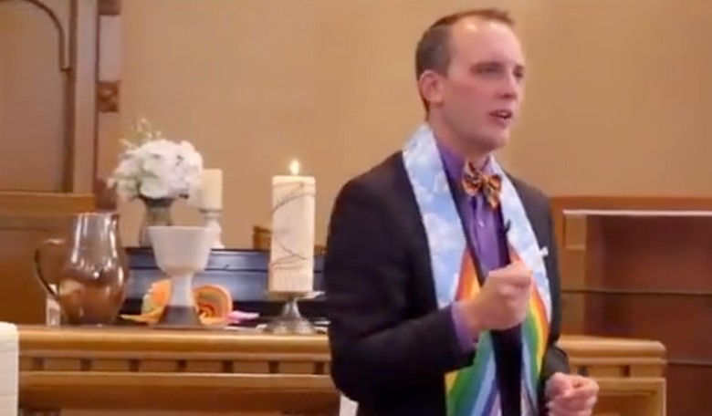 WATCH: Rainbow-Adorned Priest Delivers Woke Sermon: 'God Is Trans'
