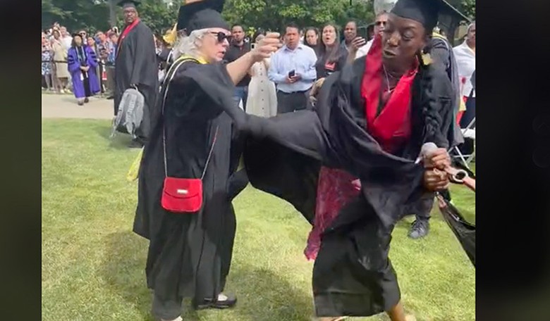 Watch: Graduating Brat Violently Rips Mic From College Admin's Hand and Announces 'Today Is All About Me!'