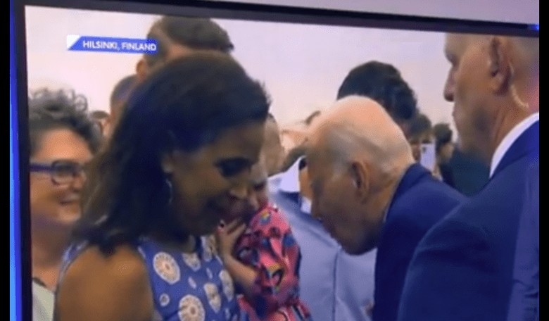 Newsmax Host Nearly Loses It in Coverage of Biden Nibbling Frightened Young Girl