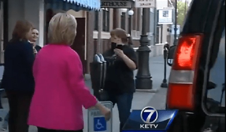 Doddering grandma forgets traffic laws and parks in handicap space