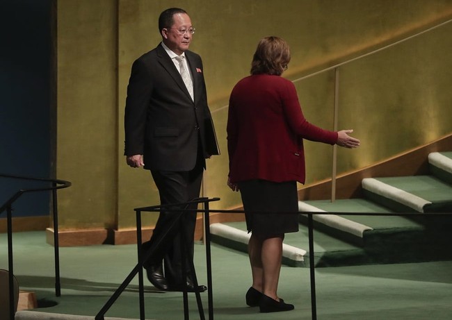 North Korea Minister for Foreign Affairs Ri Yong Ho is escorted to the podium to speak during the 72nd session of the United Nations General Assembly, Saturday, Sept. 23, 2017 at United Nations headquarters. (AP Photo/Julie Jacobson)