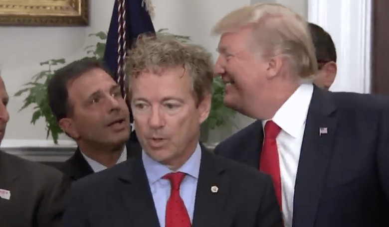 Watch: A Clearly Bothered Rand Paul Won't Even Look at Trump During Bill Signing