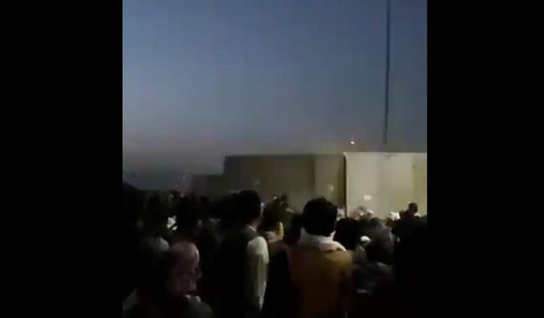 WATCH: Shots Fired in Crowd of People Trying to Flee Taliban at Gate Into Kabul Airport