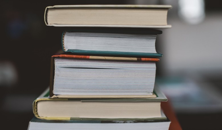 Loony Democrat School Board Member Gets Sworn Into Office on Stack of Sexually Explicit 'Banned' Books