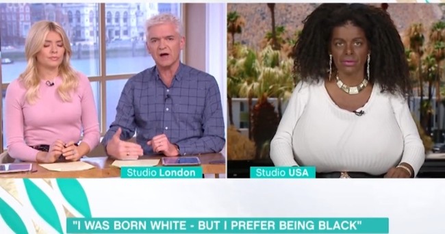 Talk show host tells white lady identifying as black that she's trivializing race, and irony's dead
