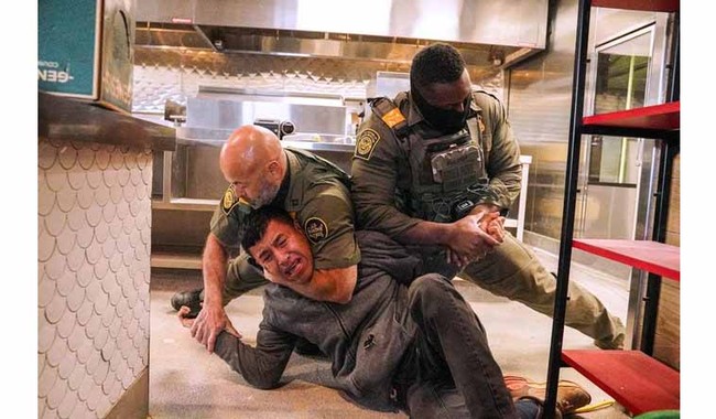 ICE Barbarian Puts Restaurant Worker in Headlock (Wait, Is That a Knife?)