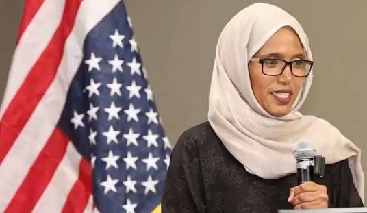 Oregon Candidate Holds Minnesota Rally Speaking Somali in Front of Upside-Down American Flag
