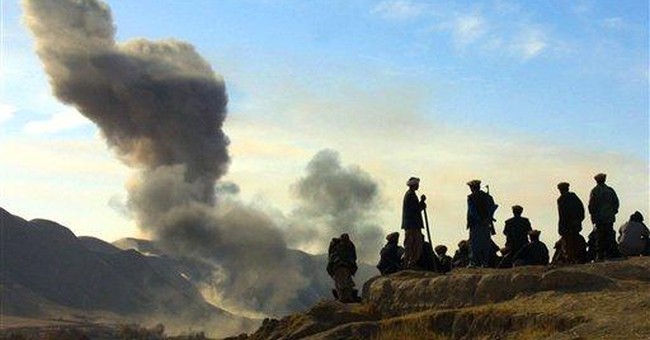 AP: Biden Admin. Launches Air Strikes on Iranian-Backed Militia Targets in Syria