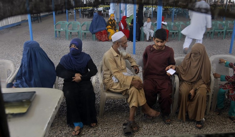 Afghan Refugees Were Placed in a Popular Vacation Hotel. Here's What Happened.