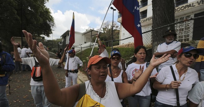 Venezuelans march in memory of those killed in unrest