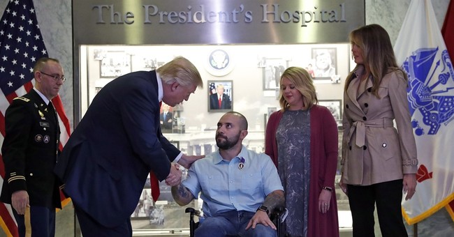 Trump awards Purple Heart at Walter Reed military hospital