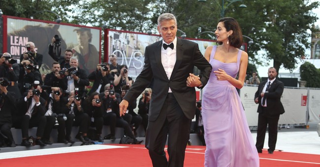 Amal Clooney Opens Up About Parenting for the First Time