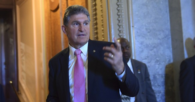 Manchin Claps, Winks at Trump While Women in White Remain Stoic