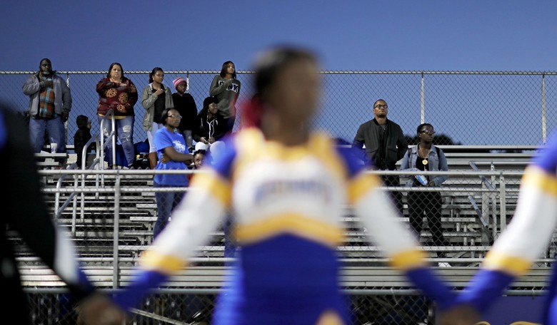 Watch: Mother Tased & Arrested for Not Wearing a Mask at Son's Middle School Football Game