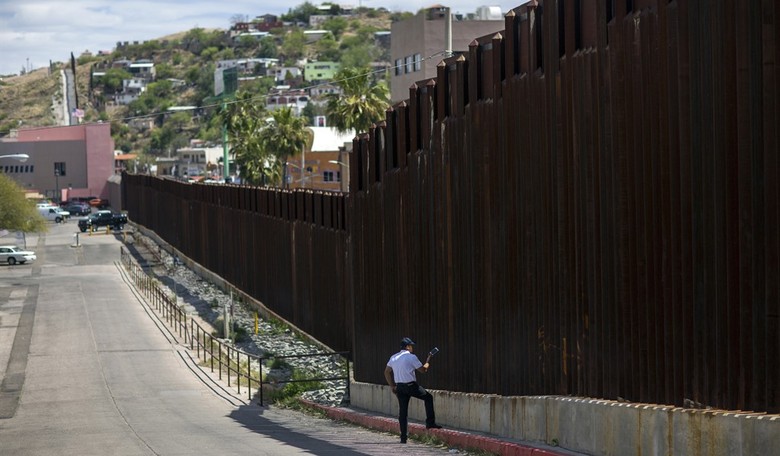 Should Trump cover the border wall with solar panels and fine art?