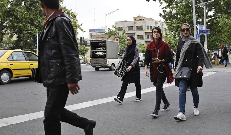 How to Avoid Getting Arrested for Breaking the Hijab Law in Iran While Giving Authorities the Finger