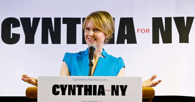 Holding a Wire Hanger, Actress Cynthia Nixon Tells Crowd About Her Mother’s Illegal Abortion