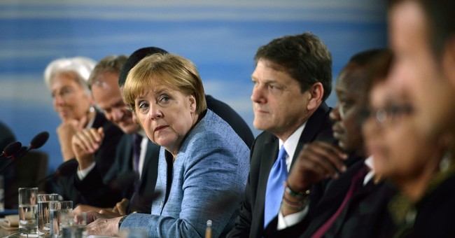 Trade War: Merkel Threatens US Over Trump Tariffs 