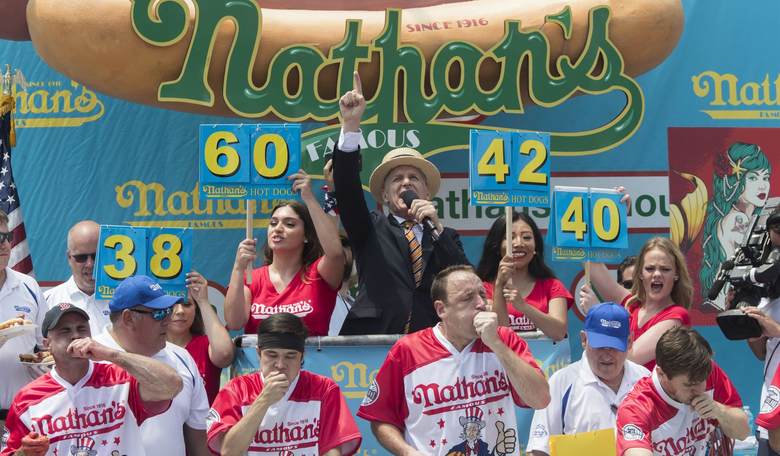 Things Didn't End Well for Animal Rights Protester Who Interrupted Hot Dog Eating Champ at Contest