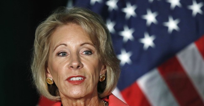 No, Betsy DeVos is Not Trying to ‘Sneak Guns Into Schools.’