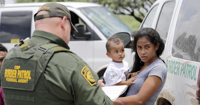 Watch Human Traffickers Distract Border Patrol Agents With Children as Illegal Aliens Cross Into the U.S. 