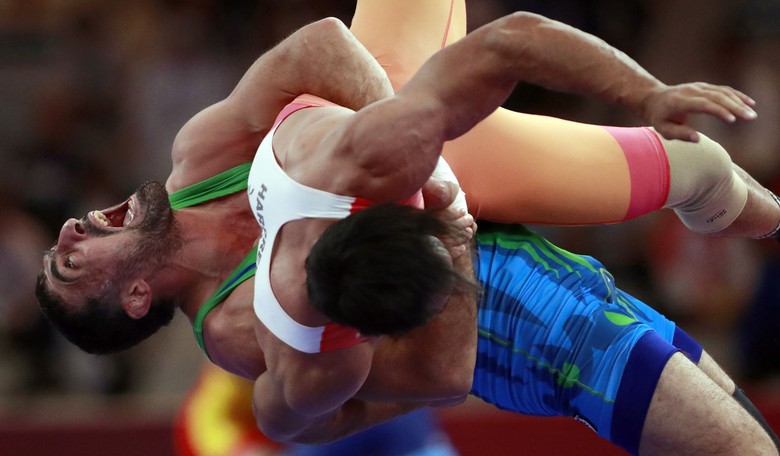 Science: State Tells Wrestlers to Get Sweaty and All Over Each Other, Just Don't Shake Hands