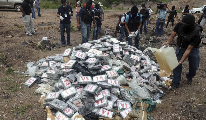 29 Guns Seized Along With Drugs, Cash