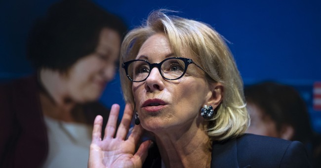 Watch Your Back: Liberal Feminist Supports Betsy DeVos Title IX Reforms 