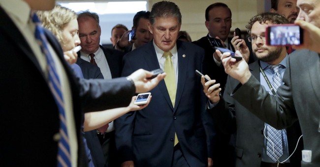 Rolling Stone Unravels in Print, Declares Joe Manchin a Planet Destroyer