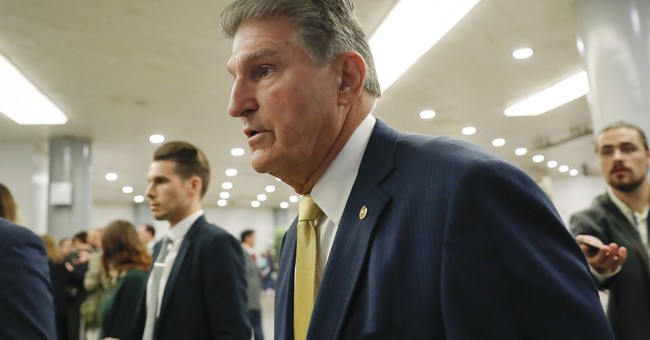 WATCH: Climate Loons Surround Manchin Then Make up Despicable Lie About Him