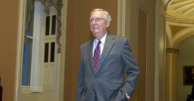 Former Obama Aide Accuses McConnell of 'Watering Down' Russia Report