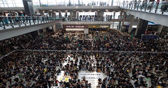 BREAKING: Riot Police Clash With Hong Kong Protestors As Airport Protest Tensions Rise