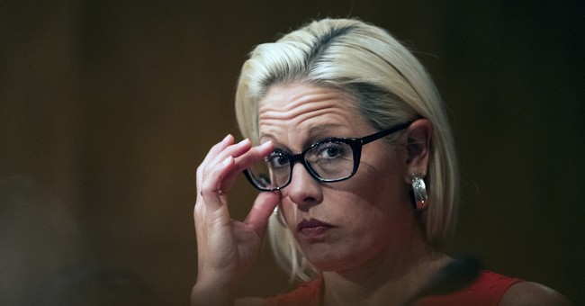 Biden Says Sinema Being Chased into a Bathroom Just 'Part of the Process'