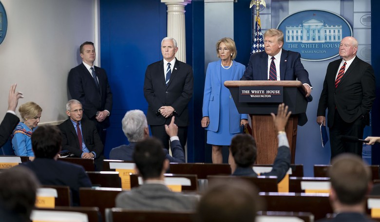 Here's How a Chinese Propagandist Ended up With Press Credentials and Questioned the President
