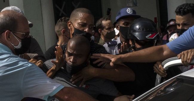 1 Dead, 140 Detained, Reporter Arrested on Live TV as Cuban Government Cracks Down on Freedom Protests