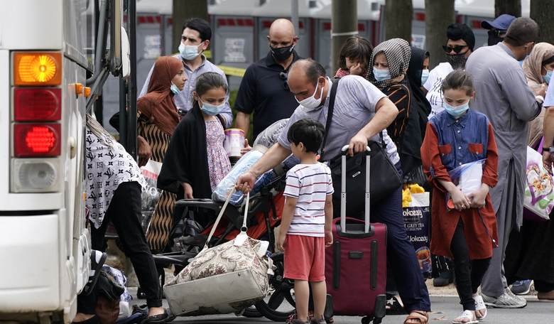 Months After Biden's Botched Afghanistan Withdrawal, Refugees Are Still on U.S. Military Bases