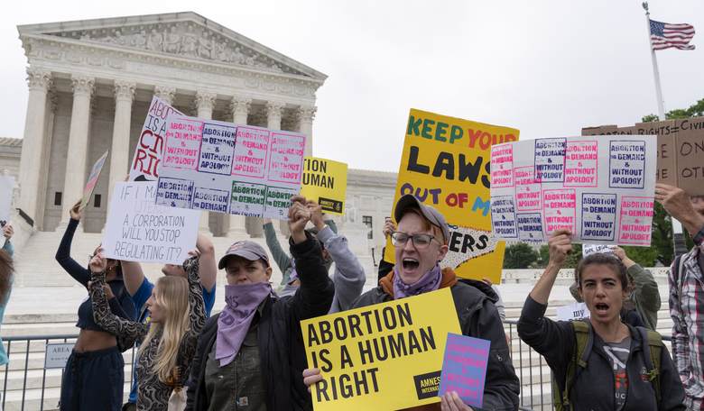 Abortion Activist Retreats to the Top of a Now-Closed Bridge to Reroute the Nation's Future