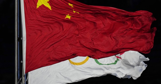 Blatant Hypocrisy: Uyghur Torchbearer for China's Olympic Team 