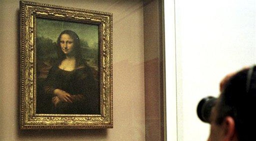 Man Attacks Mona Lisa With Cake... For Climate Change