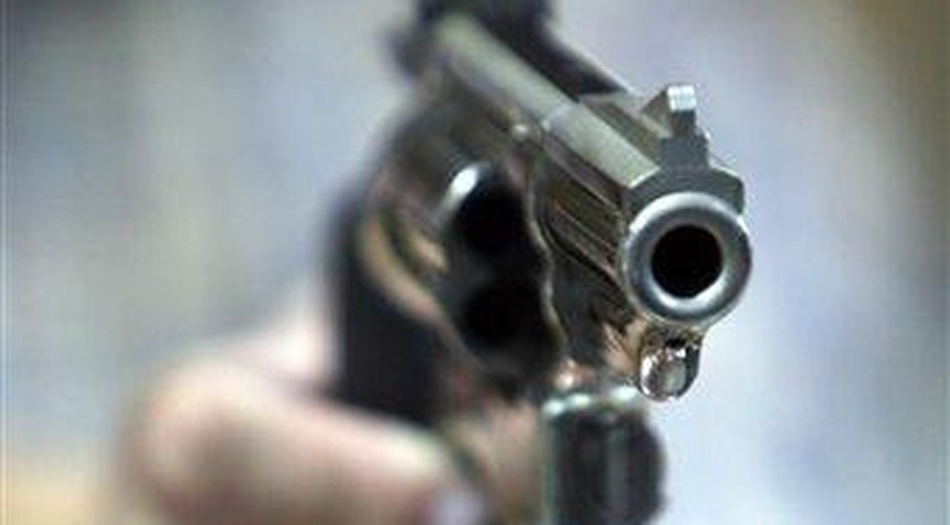 Robber Chokes Woman, Her Young Son Shoots Him in the Face